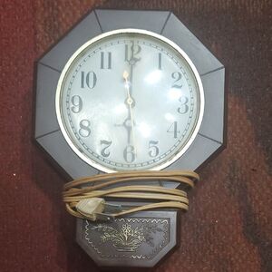 General Electric Brown Octagonal Wall Clock with Floral Accent